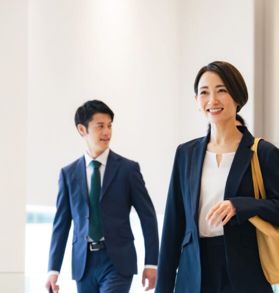 Group,Of,Various,Generation,Asian,Businesspeople,Walking,In,Lobby.,Company